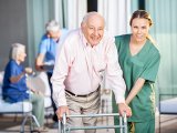cna-helping-elderly-patient-at-nursing-home[1].jpg
