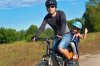10492738-family-cycling-father-with-happy-kid-riding-bicycle-outdoors.jpg